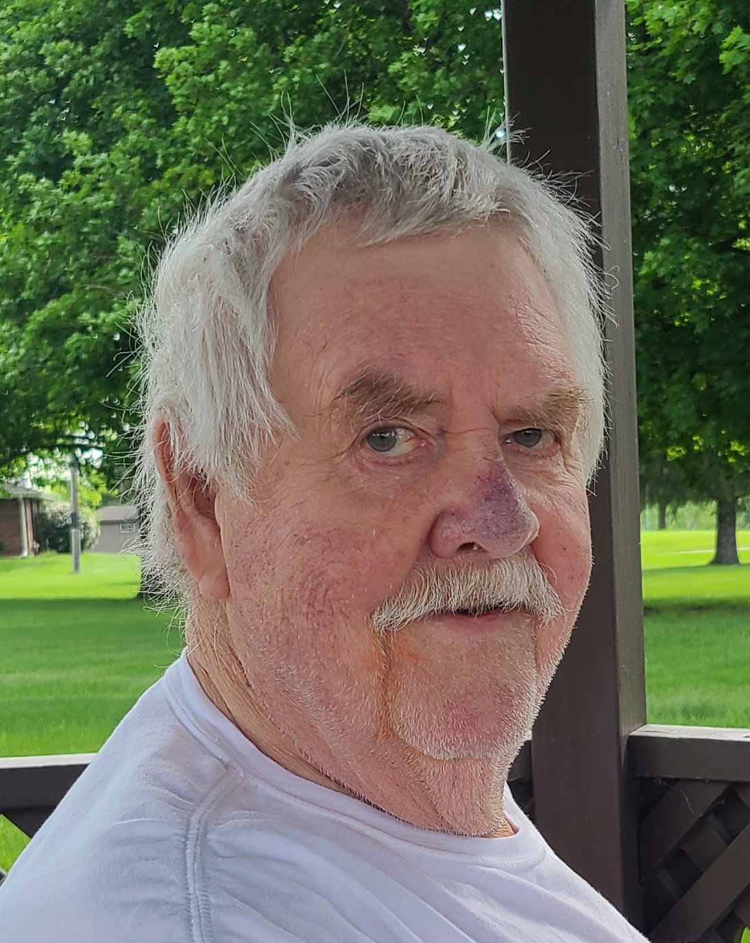 John M. Newsom age 78